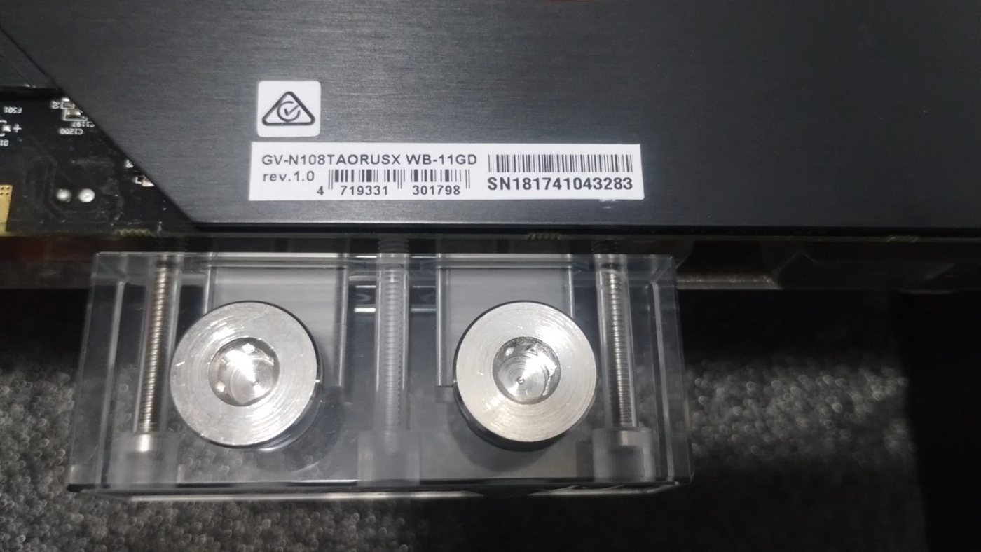 Model label GV-N108TAORUSX WB-11GD rev 1.0 and the G1/4 fitting terminal