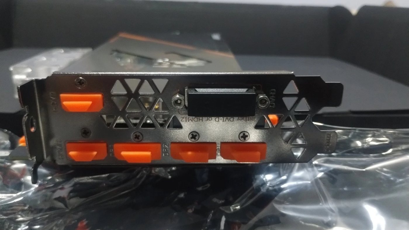 I/O bracket with port caps still fitted