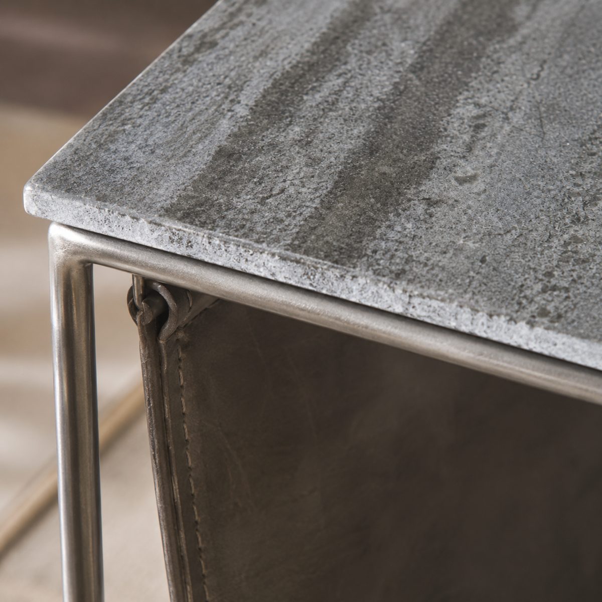 Kildare magazine side table — stone top and metal frame close-up
