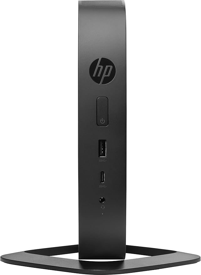 HP t530 thin client, front view on stand — HP logo, power button, USB-A, USB-C and audio jack