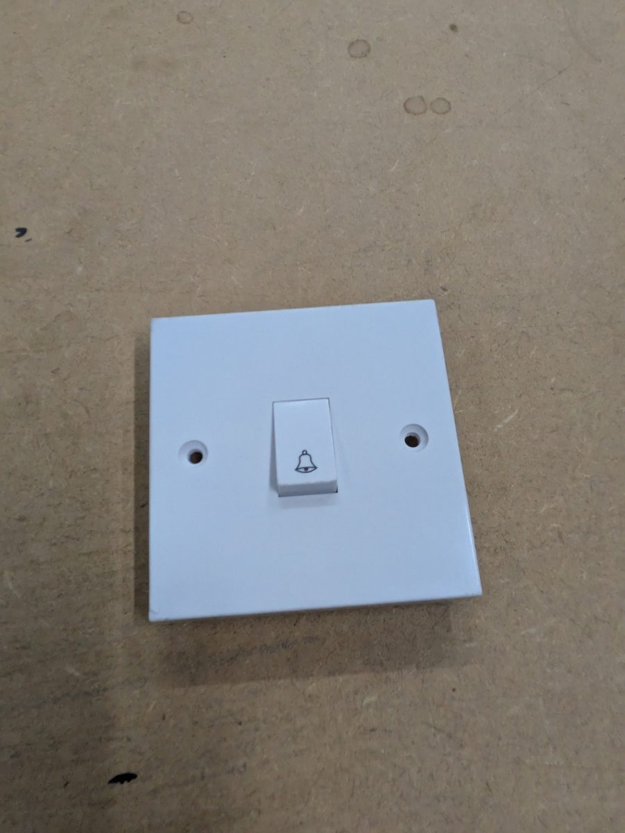 V1249/BX 10A X-rated press switch marked with bell symbol — surplus UK stock